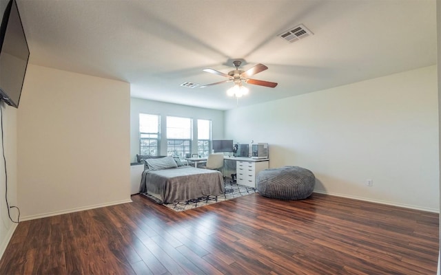 504 Dark Tree Ln, Round Rock, TX 78664 - bedroom featuring wood finished floors, an office area, and ceiling fan