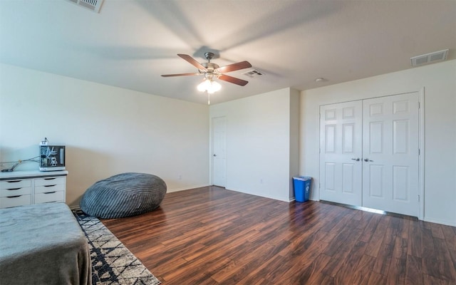 504 Dark Tree Ln, Round Rock, TX 78664 - bedroom featuring wood finished floors, a ceiling fan, and a closet