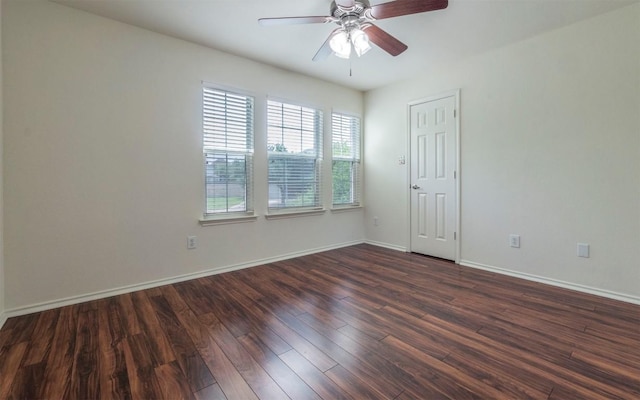 504 Dark Tree Ln, Round Rock, TX 78664 - spare room with a ceiling fan and dark wood-style flooring