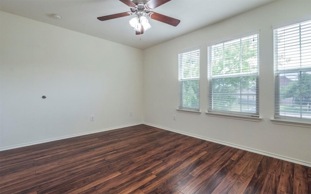 504 Dark Tree Ln, Round Rock, TX 78664 - empty room with dark wood finished floors, ceiling fan, and a smoke detector