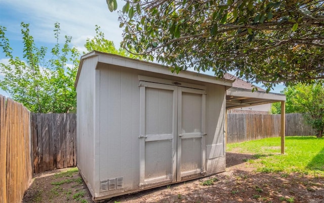 504 Dark Tree Ln, Round Rock, TX 78664 - view of shed with a fenced backyard