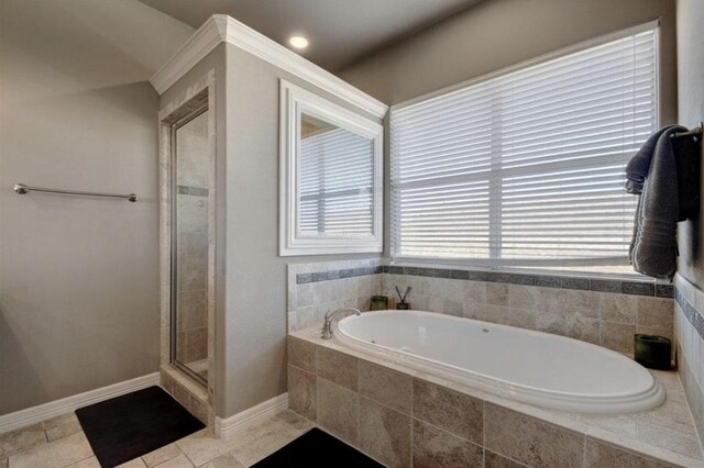 1621 Enfield Rd Unit B, Austin, TX 78703 - bathroom with a garden tub, a shower stall, and tile patterned flooring