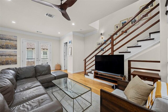 1621 Enfield Rd Unit B, Austin, TX 78703 - living area featuring stairs, wood finished floors, a ceiling fan, crown molding, and recessed lighting