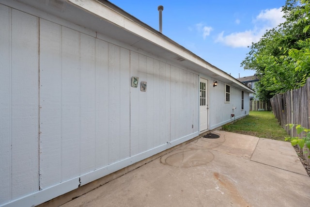 view of patio featuring fence