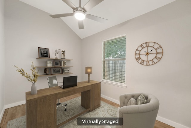 office featuring baseboards and wood finished floors