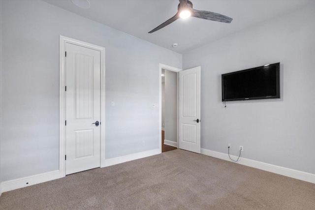 205 Bisset Ct, Austin, TX 78738 - unfurnished bedroom with carpet and a ceiling fan