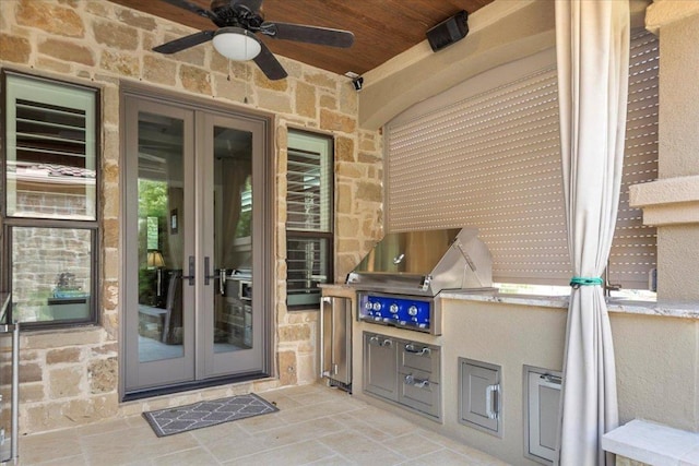 205 Bisset Ct, Austin, TX 78738 - view of patio with french doors, ceiling fan, and exterior kitchen