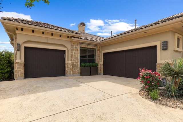 205 Bisset Ct, Austin, TX 78738 - view of front facade with an attached garage, stone siding, a chimney, driveway, and stucco siding