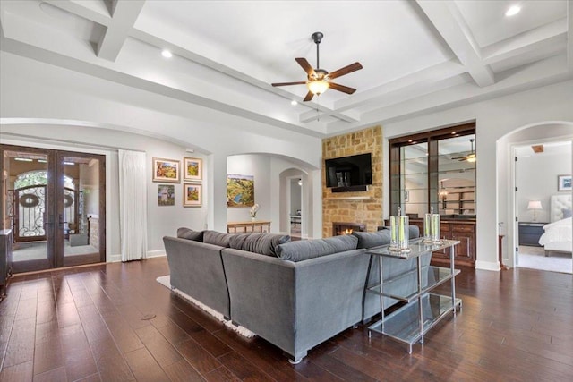 205 Bisset Ct, Austin, TX 78738 - living area featuring ceiling fan, arched walkways, coffered ceiling, recessed lighting, and beamed ceiling