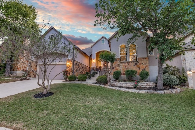 29047 Hobblebush, San Antonio, TX 78260 - view of front facade with stone siding, concrete driveway, an attached garage, and stucco siding