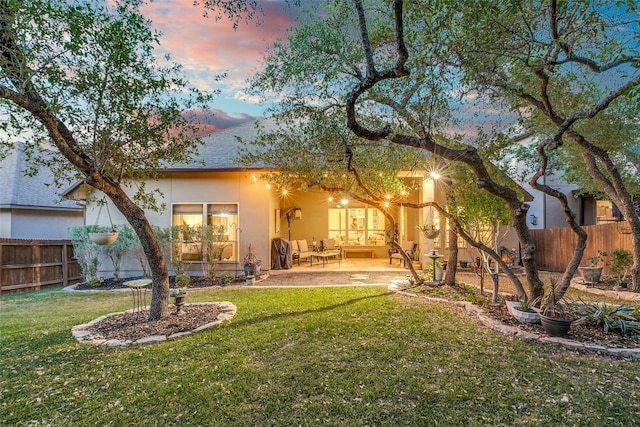 29047 Hobblebush, San Antonio, TX 78260 - back of house at dusk featuring a patio area and stucco siding