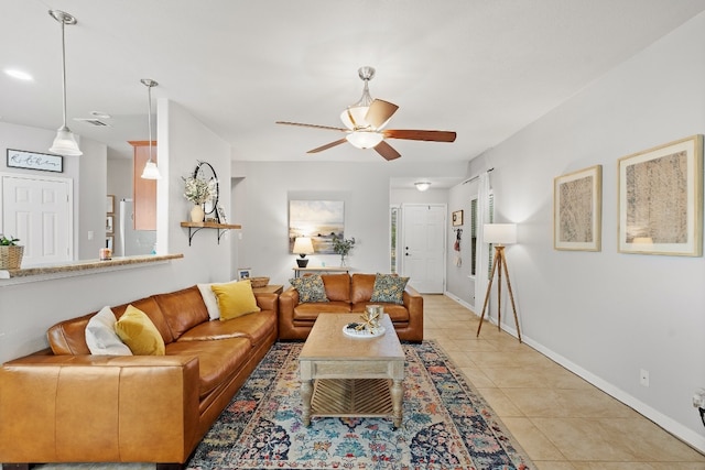 19000 Obed River Dr, Pflugerville, TX 78660 - living area with baseboards, ceiling fan, and light tile patterned floors