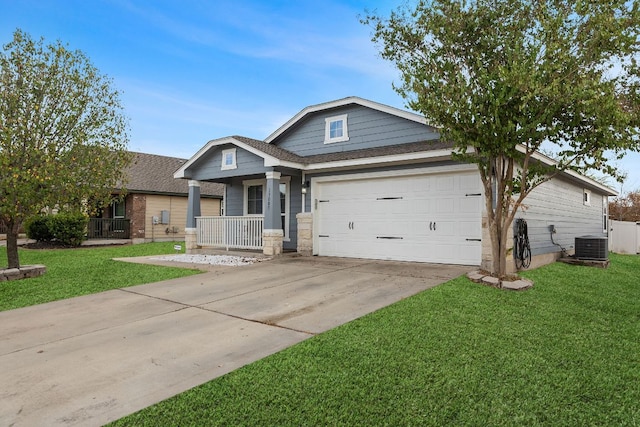 19000 Obed River Dr, Pflugerville, TX 78660 - view of front of home featuring a front lawn, cooling unit, driveway, a porch, and a garage
