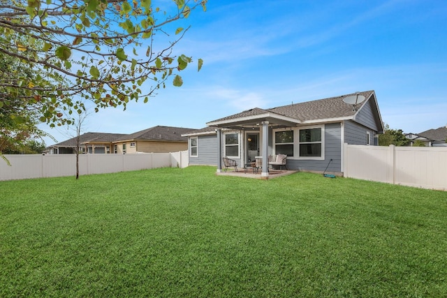 19000 Obed River Dr, Pflugerville, TX 78660 - back of house with a fenced backyard, a patio area, and a shingled roof