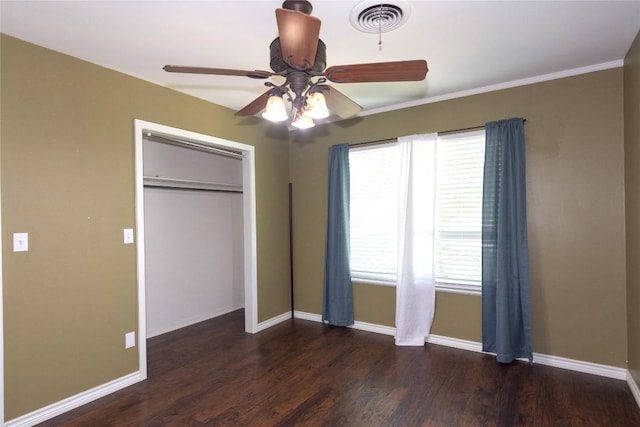 1212 Lake Terrace Dr, Elgin, TX 78621 - unfurnished bedroom featuring a closet, wood finished floors, visible vents, and baseboards