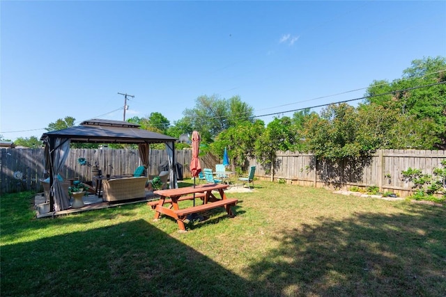 1212 Lake Terrace Dr, Elgin, TX 78621 - view of yard with a fenced backyard and a gazebo
