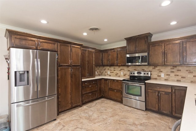 1212 Lake Terrace Dr, Elgin, TX 78621 - kitchen featuring appliances with stainless steel finishes, dark brown cabinets, visible vents, and light countertops