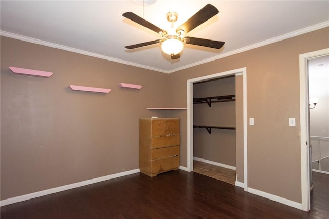 1212 Lake Terrace Dr, Elgin, TX 78621 - unfurnished bedroom featuring a ceiling fan, crown molding, wood finished floors, a closet, and baseboards