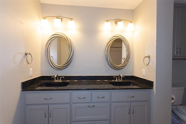 1212 Lake Terrace Dr, Elgin, TX 78621 - full bath with double vanity, toilet, and a sink