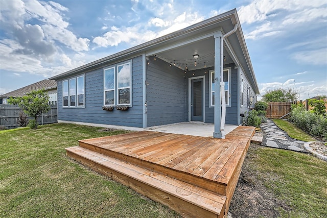 9945 Comely Bnd, Manor, TX 78653 - back of property featuring a wooden deck