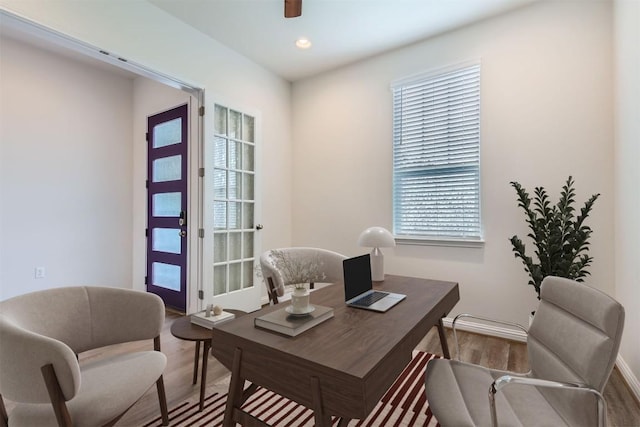 9945 Comely Bnd, Manor, TX 78653 - office featuring wood finished floors and recessed lighting