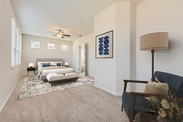 9945 Comely Bnd, Manor, TX 78653 - bedroom with light carpet, baseboards, and a ceiling fan