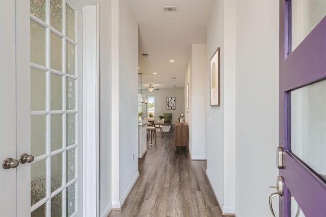 9945 Comely Bnd, Manor, TX 78653 - foyer entrance with wood finished floors, a ceiling fan, and recessed lighting