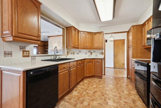 21009 Fawn Ridge Dr, Lago Vista, TX 78645 - kitchen featuring a sink, brown cabinets, and black appliances