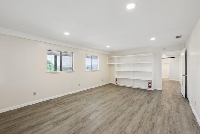 21009 Fawn Ridge Dr, Lago Vista, TX 78645 - interior space featuring visible vents, baseboards, wood finished floors, and recessed lighting