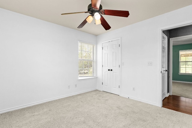 6060 County Road 3300, Kempner, TX 76539 - unfurnished bedroom with baseboards, carpet, a closet, and ceiling fan