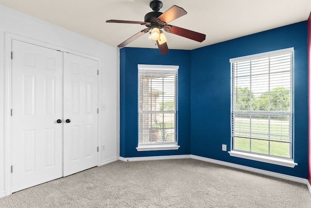 6060 County Road 3300, Kempner, TX 76539 - unfurnished bedroom with baseboards, a ceiling fan, carpet flooring, and a closet