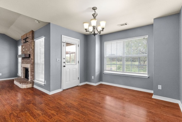 6060 County Road 3300, Kempner, TX 76539 - interior space with wood finished floors, visible vents, a notable chandelier, and a healthy amount of sunlight