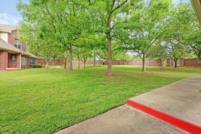 view of yard with fence