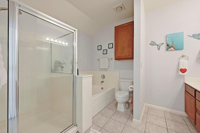 bathroom with a bath, tile patterned floors, lofted ceiling, a shower stall, and vanity