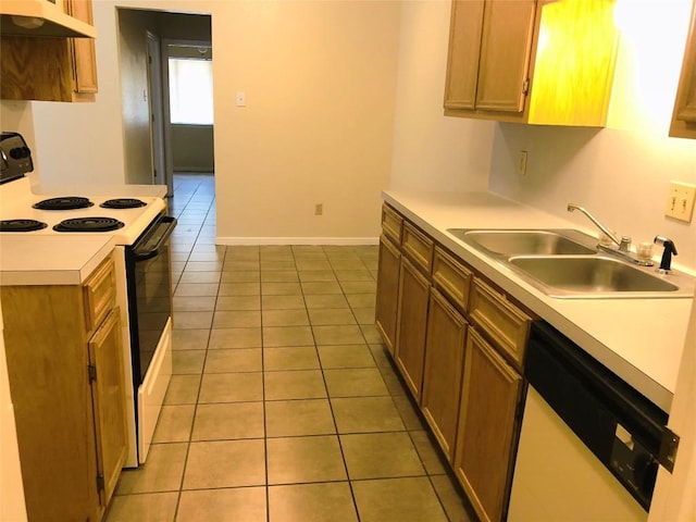 kitchen with electric stove, a sink, light tile patterned floors, dishwasher, and under cabinet range hood