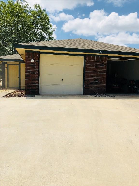 garage with driveway
