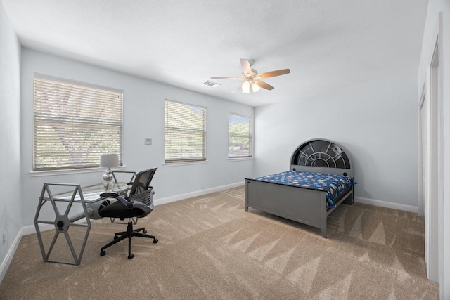 bedroom with carpet, baseboards, and ceiling fan