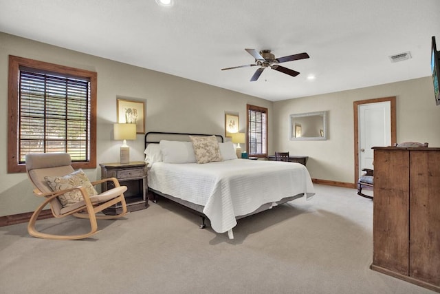 bedroom featuring light carpet, baseboards, visible vents, recessed lighting, and a ceiling fan