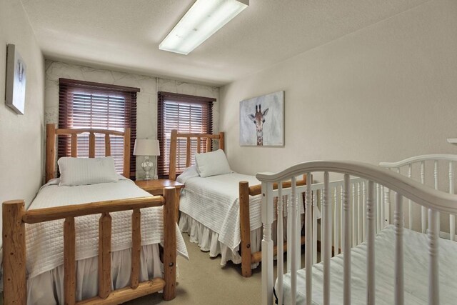 bedroom featuring carpet flooring