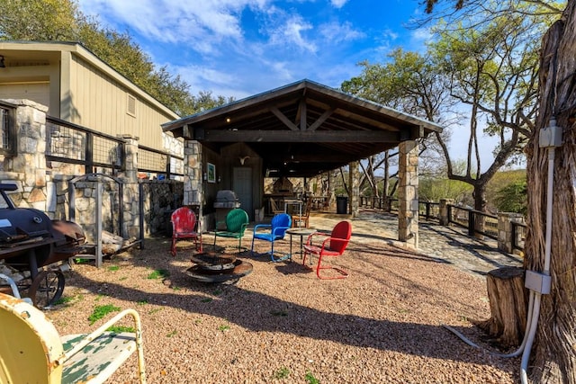 exterior space with a gazebo and fence
