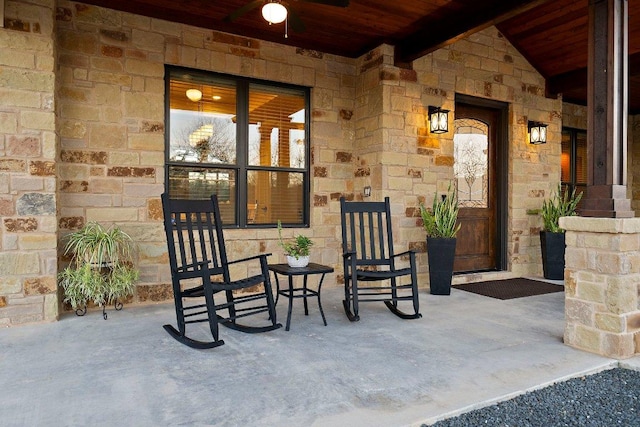 entrance to property with stone siding