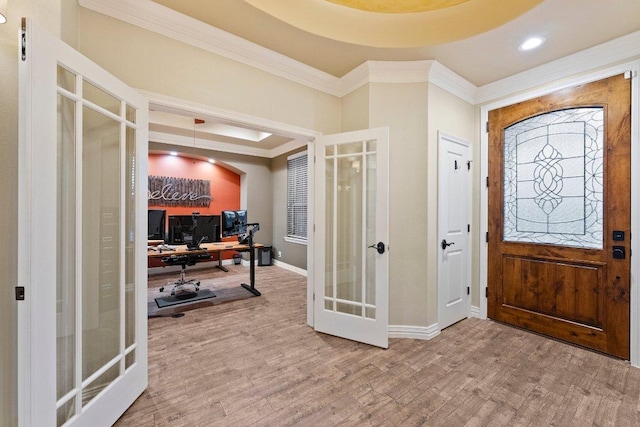 entrance foyer featuring recessed lighting, wood finished floors, french doors, crown molding, and baseboards