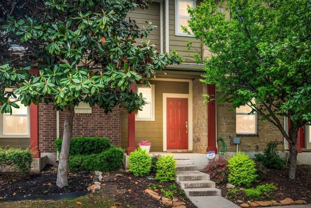 608 Lookout Tree Ln, Round Rock, TX 78664 - doorway to property with brick siding and stone siding