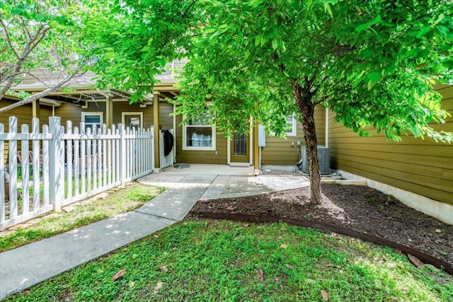 608 Lookout Tree Ln, Round Rock, TX 78664 - exterior space with central AC, fence, and a patio
