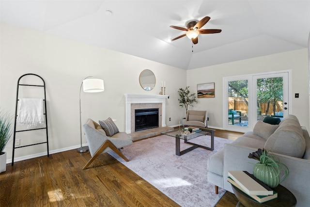 3614 Serena Woods Ct, Austin, TX 78759 - living area featuring vaulted ceiling, a ceiling fan, wood finished floors, a fireplace, and baseboards