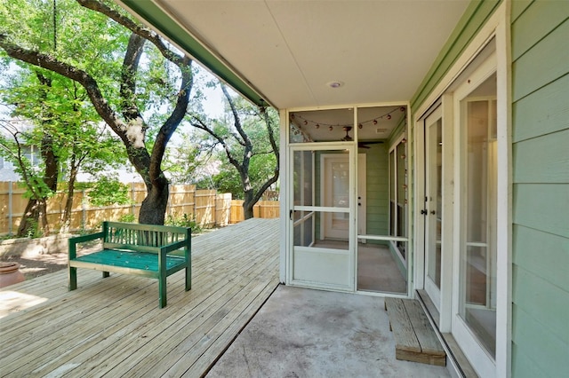 3614 Serena Woods Ct, Austin, TX 78759 - wooden deck with fence and a sunroom