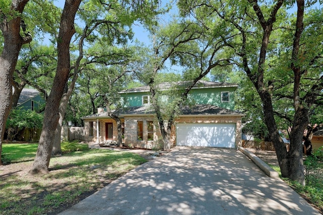 3614 Serena Woods Ct, Austin, TX 78759 - traditional-style house featuring fence, stone siding, and concrete driveway