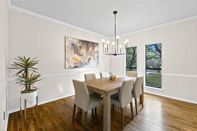 3614 Serena Woods Ct, Austin, TX 78759 - dining space with wood finished floors, an inviting chandelier, and ornamental molding