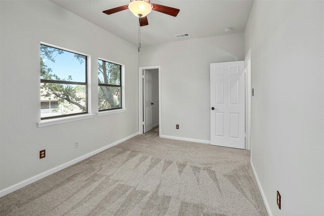 3614 Serena Woods Ct, Austin, TX 78759 - unfurnished bedroom featuring ceiling fan, baseboards, carpet flooring, and visible vents