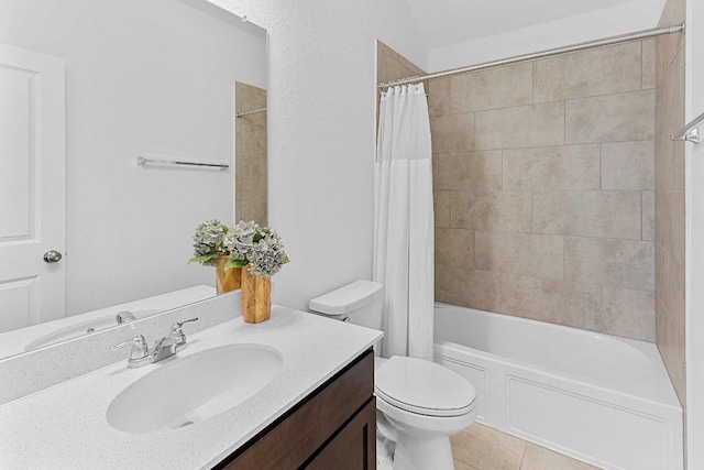 12207 Coronilla Bnd, Austin, TX 78748 - full bathroom featuring toilet, tile patterned flooring, vanity, and shower / bathtub combination with curtain